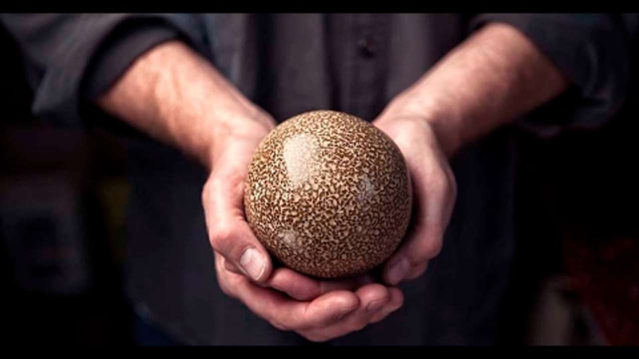 An artist transforms balls of dirt into beautiful, shiny spheres like none you've seen.